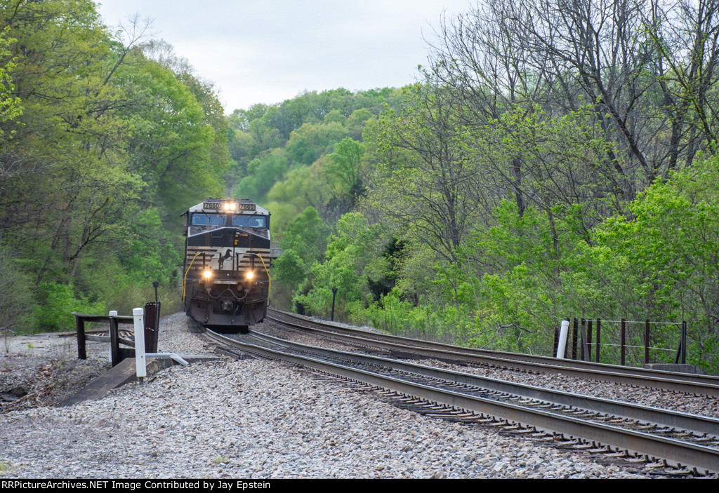 An eastbound rounds the curve at Montgomery